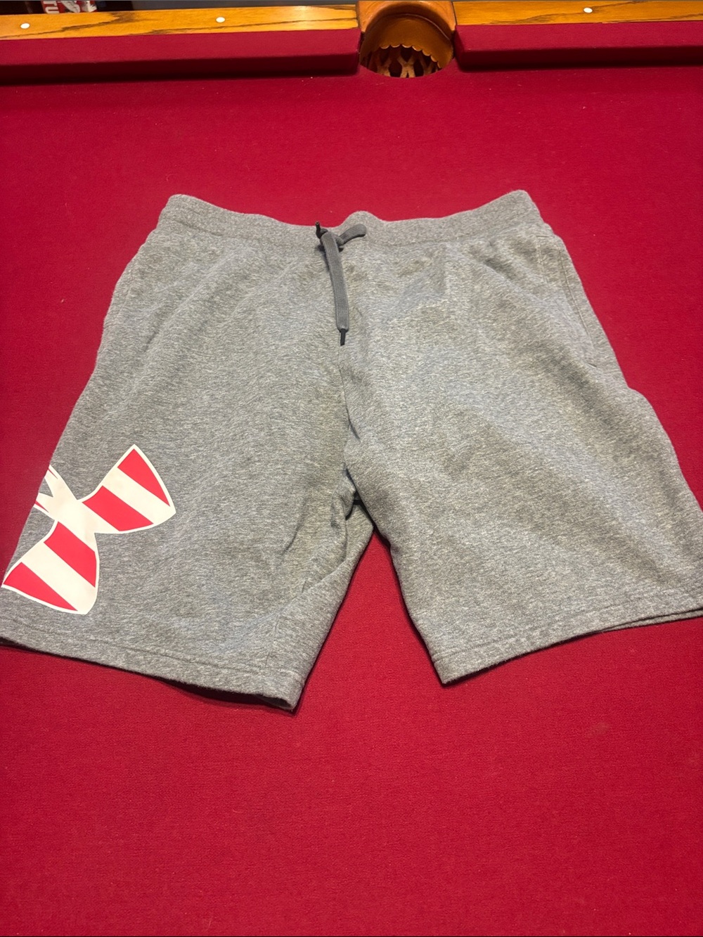 Under Armour Men's Gray Athletic Shorts with Red Logo Accent